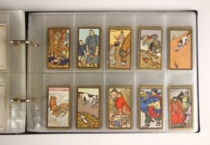 A collection of cigarette and tea cards to 35 albums (one empty), to include forty eight Chinese
