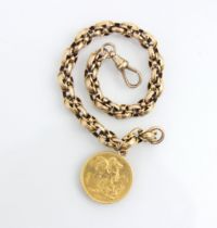 A 19th century yellow metal bracelet, the circular links enclosing two smaller circular links,