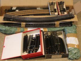 A quantity of Peco Streamline 'O' gauge model railway track, to include straights and curves, with