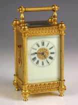 A French brass cased eight day miniature carriage timepiece, stamped 'R & Co, made in Paris',