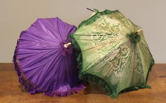 A mid Victorian purple silk taffeta parasol, with purple knotted fringe, lined with silk, with white