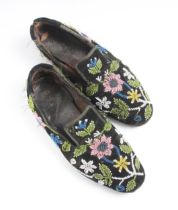 A pair of mid Victorian Gentlemen's moccasin type velvet and beadwork slipper, embellished with