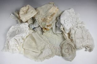 A collection of children's and ladies bonnets, predominantly 19th century, to include Ayrshire work,