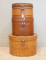 Three 19th cenutry scumbled toleware hat boxes, largest measuring 28cm high x 43cm wide, smallest