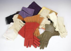 Four pairs of leather driving gloves by Penberthy, circa 1930, in tan, red, green and beige,