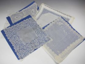 A collection of fourteen fine quality white and ivory lawn and silk handkerchiefs, comprising;