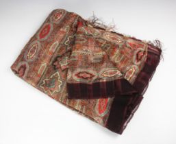 A fine silk gauze Victorian polychrome printed Paisley shawl, circa 1850, cut and re-joined,