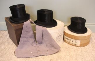 An early 20th century Gentleman's silk top hat by F.W.Knowles of Chester, approximately 56cm