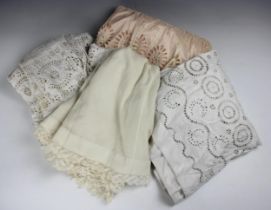 Three mid-Victorian broderie Anglaise cotton petticoats, together with a late 19th century blush