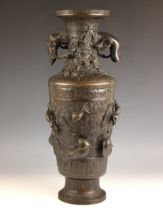A Japanese bronze vase, Meiji Period (1868-1912), of large cylindrical proportions and applied
