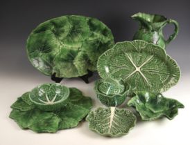 A collection of green-glazed cabbage leaf pottery, 20th century, to include a tureen and cover, 14cm
