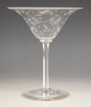 A Victorian etched and cut glass comport, the faceted column on a spreading circular base,