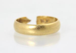 A yellow metal wedding band, stamped Birmingham 1969, 5gms (at fault)