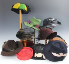 A collection of twelve early 20th century ladies hats, circa 1920-1940, to include straw, felt and