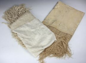 A Chinese cream ground silk embroidered shawl, approx 150cm excluding fringe (some discoloration),