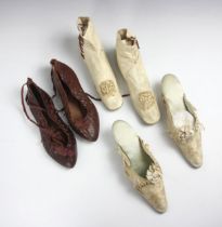 A pair of silk brocade mules, circa 1890, by F Pinet of Paris, 25cm long, together a pair of