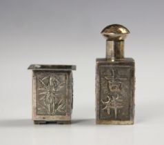 A Chinese silver cache pot, the embossed sides with bamboo and floral depiction, upon four bracket