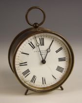 An eight day brass cased GWR railway drum clock, by J.M Skarratt & Co, Paris, the 9cm white