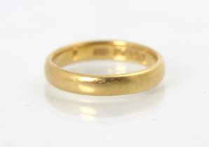 A 22ct wedding band, stamped ACCo, Birmingham 1922, ring size P 1/2, 5.9gms