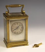 A French brass cased eight day repeating carriage clock, by Guy, Lamaille and Co, circa. 1890, the