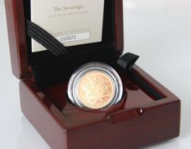 An Elizabeth II full sovereign, dated 2022, within clear plastic protective case and box, with