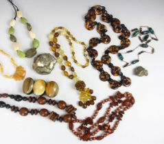 A selection of beaded costume jewellery, including faux tortoiseshell necklace example, turned