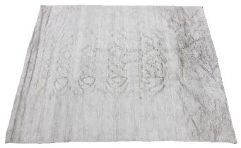 An Oka Skye linen rug, in mottled grey, 40% linen, 40% viscose, 20% cotton, 244cm x 305cm