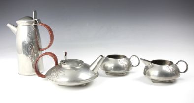 A mid 20th century Liberty ‘Heritage’ pewter four piece tea service, after Archibold Knox,
