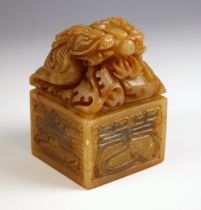 A large Chinese soapstone seal, 20th century, carved with two 'Chilong' beasts above Kaishu