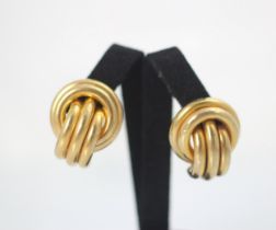 A pair of 9ct yellow gold earrings, the hollow raised double circular link with triple strand detail