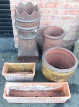 A salt glazed crown top chimney pot planter, of tapering cylindrical section, 79cm high, a