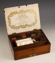 A Windsor & Newton artist's watercolour paint box, late 19th or early 20th century, with labelled