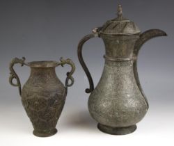 A pewter ewer, 20th century, of typical form, with foliate, floral and geometric patterns