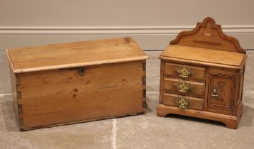 A Victorian pine apprentice chest in the form of a sideboard, modelled with a raised back over an