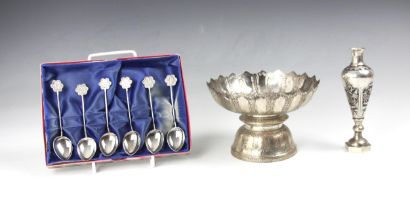 A cased set of six teaspoons, stamped 'Silver' to reverse of terminal, each with shaped terminal and