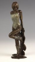 A limited edition bronze figure modelled as a female dancer wearing a patinated leotard, maker's