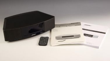 A Bose 'Wave Music System IV', with remote control and instruction manual (all untested)