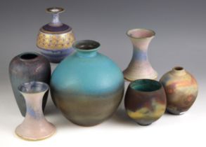 A collection of seven studio pottery vases, to include an ovoid stem vase by Julie Furminger