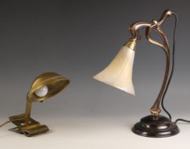 An Art Nouveau style bronze patina desk lamp, mid 20th century, paper label to the underside 'Made