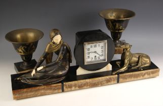 A French Art Deco slate, marble and spelter timepiece garniture, the clock with a 10cm silvered