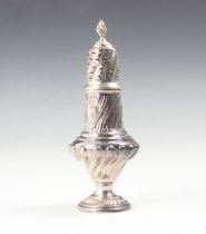 A Victorian silver sugar sifter, Thomas Bradbury & Sons, London 1892, with flame finial above an