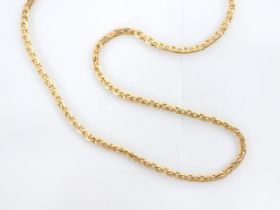 A yellow metal necklace, the flat link chain of curb link detail, with bolt ring fastening,