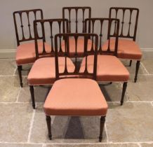 A set of six Sheraton style mahogany dining chairs, 19th century, the rail backs with central