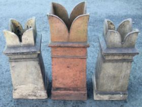 A pair of stoneware crown top chimney pot/planters, each of tapering square section, 70cm high,