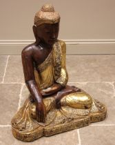 A modern carved wooden Buddha of large proportions, modelled seated cross-legged on an ornate