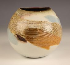 Jack Doherty (British, b.1948), a studio pottery bowl of globular form, the half combed body below