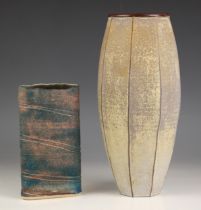 Emily Myers (b.1965), a studio pottery terracotta faceted vase, of slender form, the body