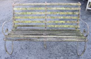 An Edwardian slatted garden bench, with wrought iron scroll supports, 90cm H x 152cm W