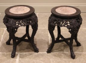 A pair of Chinese carved hardwood and rouge marble jardinière stands, early 20th century, the