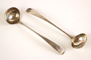 A pair of Victorian silver ladles, possibly John Zeigler, Edinburgh 1831, the terminals with crest